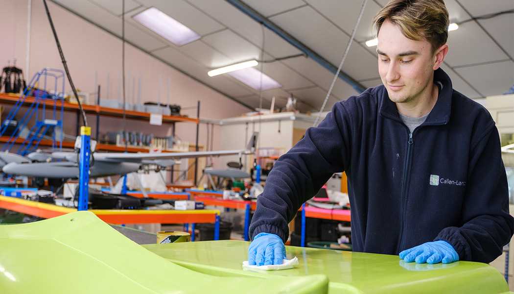 An engineer working on components